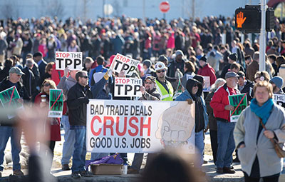 CWA Members and retirees from Local 7400 and 7470, and activists all over Nebraska as they rallied outside the Univ. of Nebraska as President Obama was visiting, after his State of the Union Address.